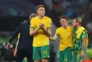Heartbroken Australia bow out with heads held high