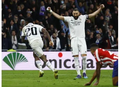 Benzema, Vinicius strike as Real fight back to sink Atletico